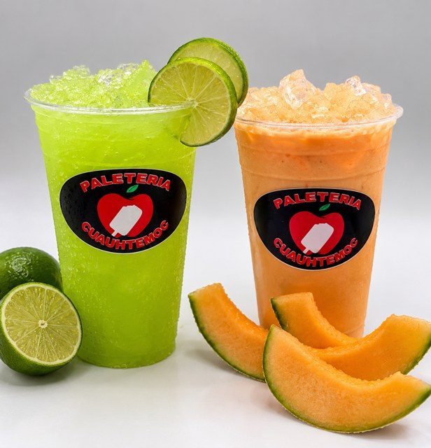 Lime and cantaloupe drinks over crushed ice in Paletería Cuauhtémoc cups.