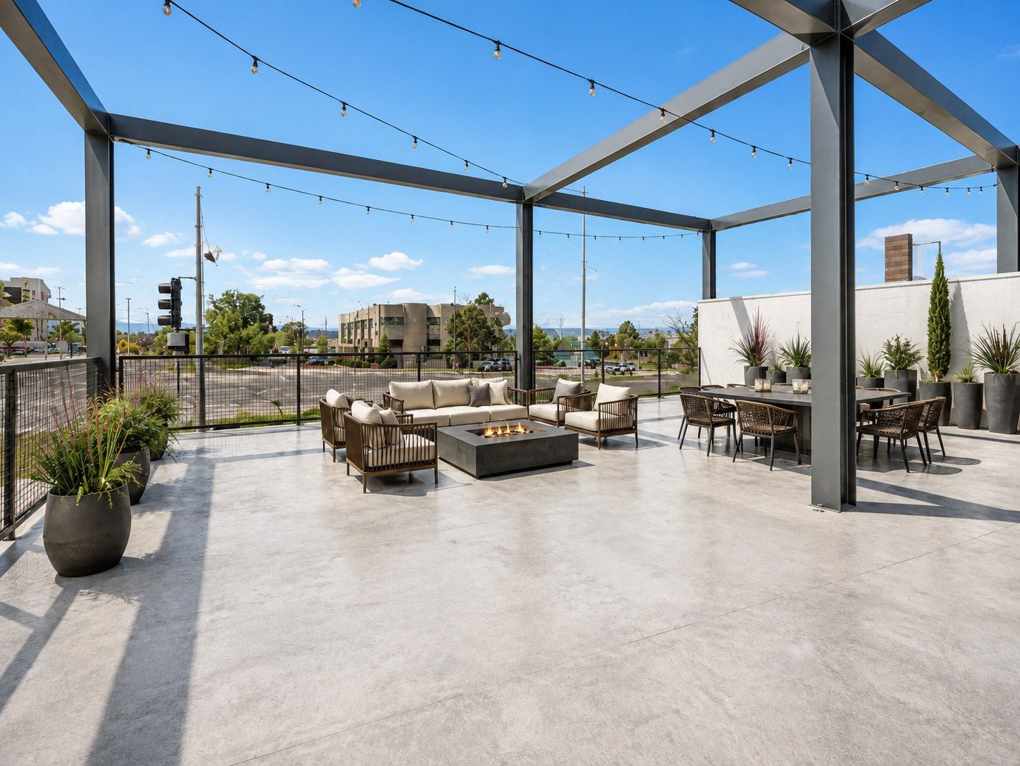 Patio seating with a fire pit and mountain views at Yale Landing.
