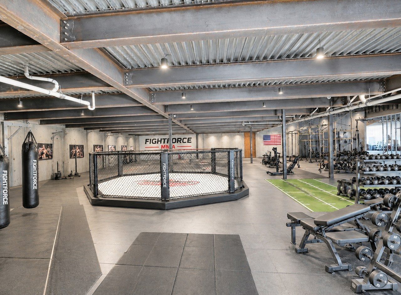 Conceptual rendering of an MMA and strength training facility in Suite E and F.